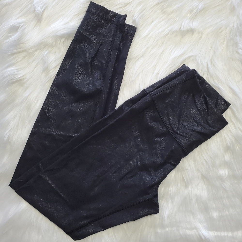 Lululemon black speckled leggings, size 4.